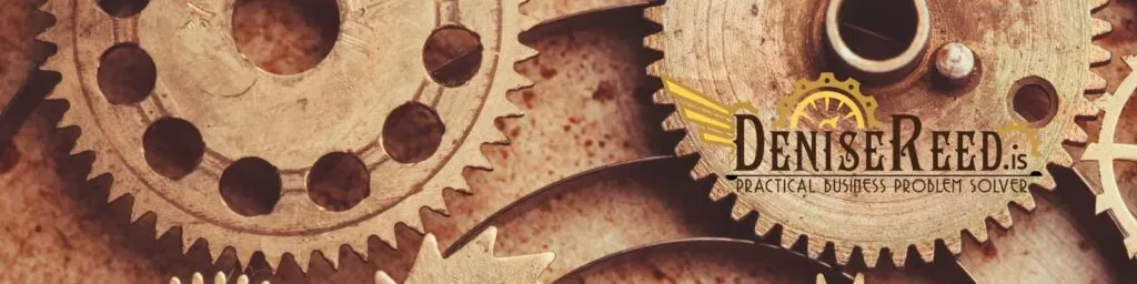 Interlocking brass gears symbolizing streamlined business operations